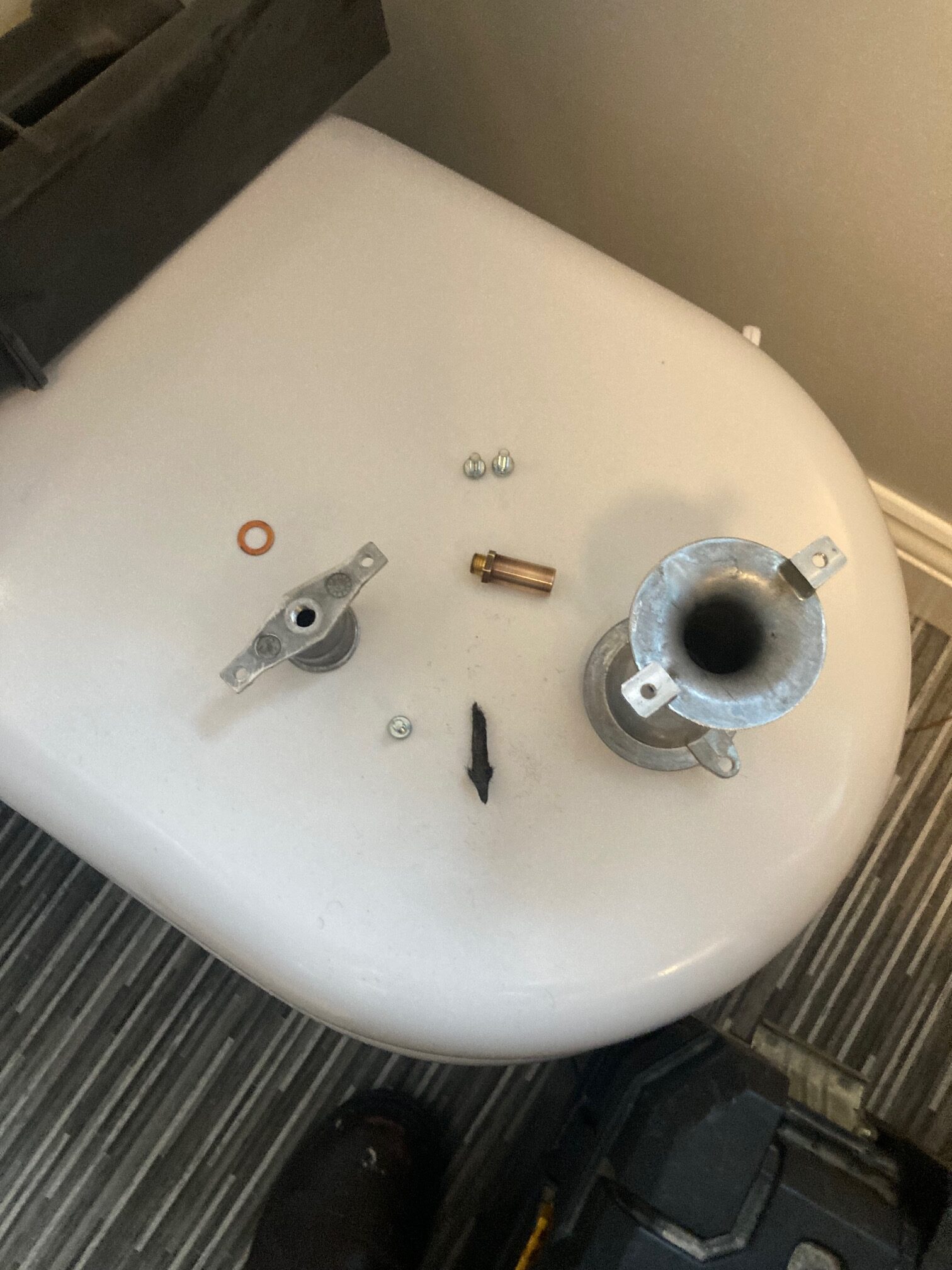 Disassembled Ideal Logic gas injector and Venturi during boiler service in Louth